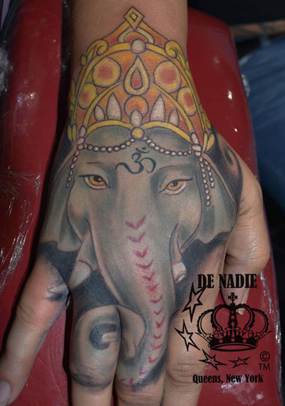 Elephant hand tattoo